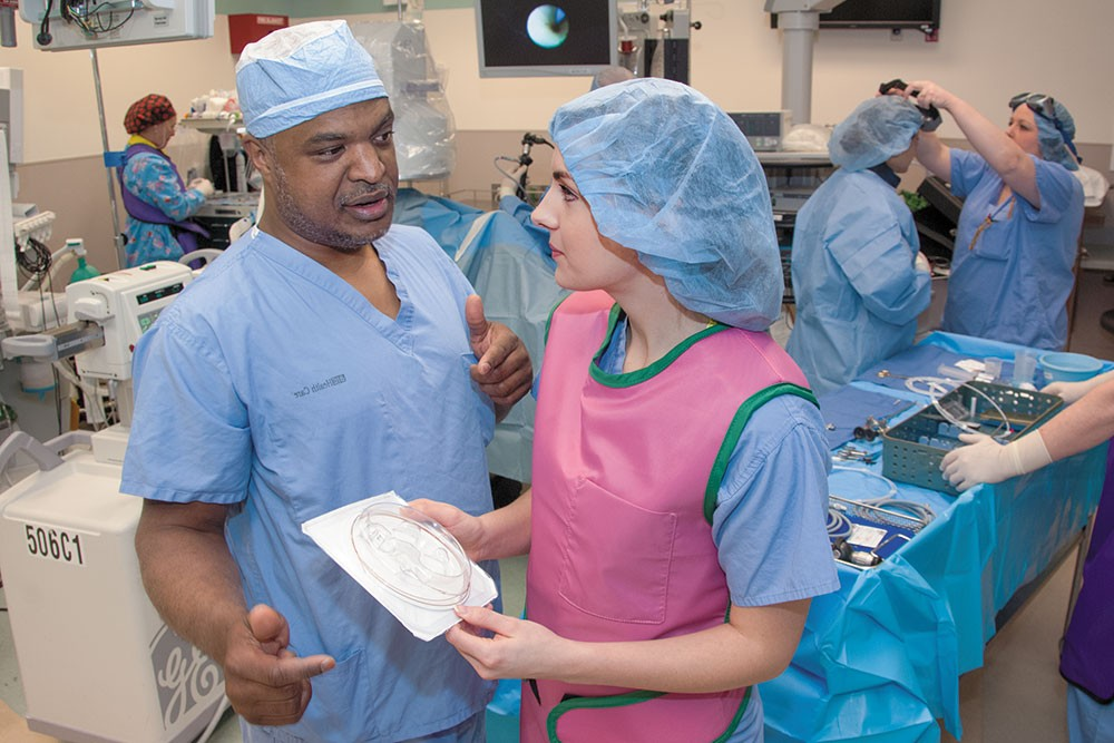 Doctor and nurse in surgery room 